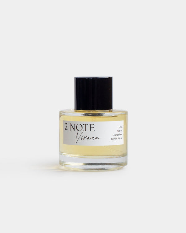 Vivace in clear glass spray bottle — botanical natural fragrance, pale yellow oil, front view on white