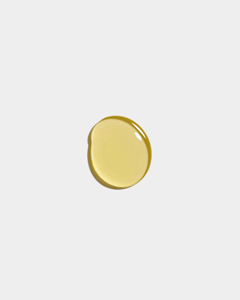 Beard and Face Finishing Oil formula swatch — botanical natural oil texture on white surface